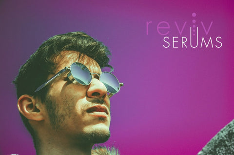 Man with thick hair, Reviv Serums logo